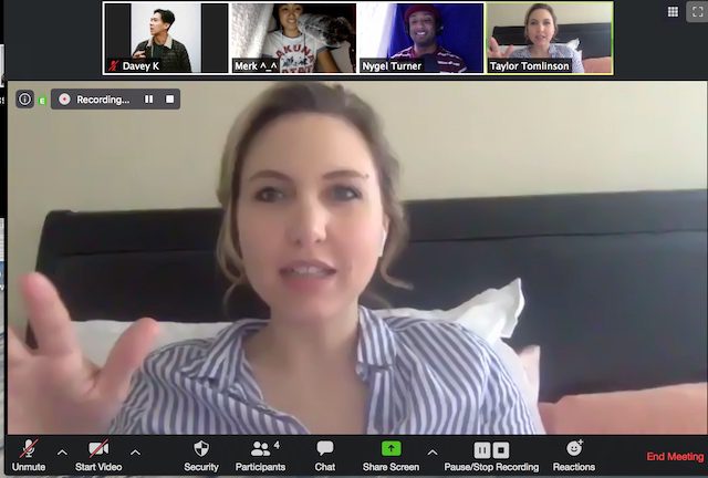 Taylor is on the big screen on a Zoom meeting where she's joined by senior producer Davey Kim and co-hosts, Merk Nguyen and Nyge Turner.