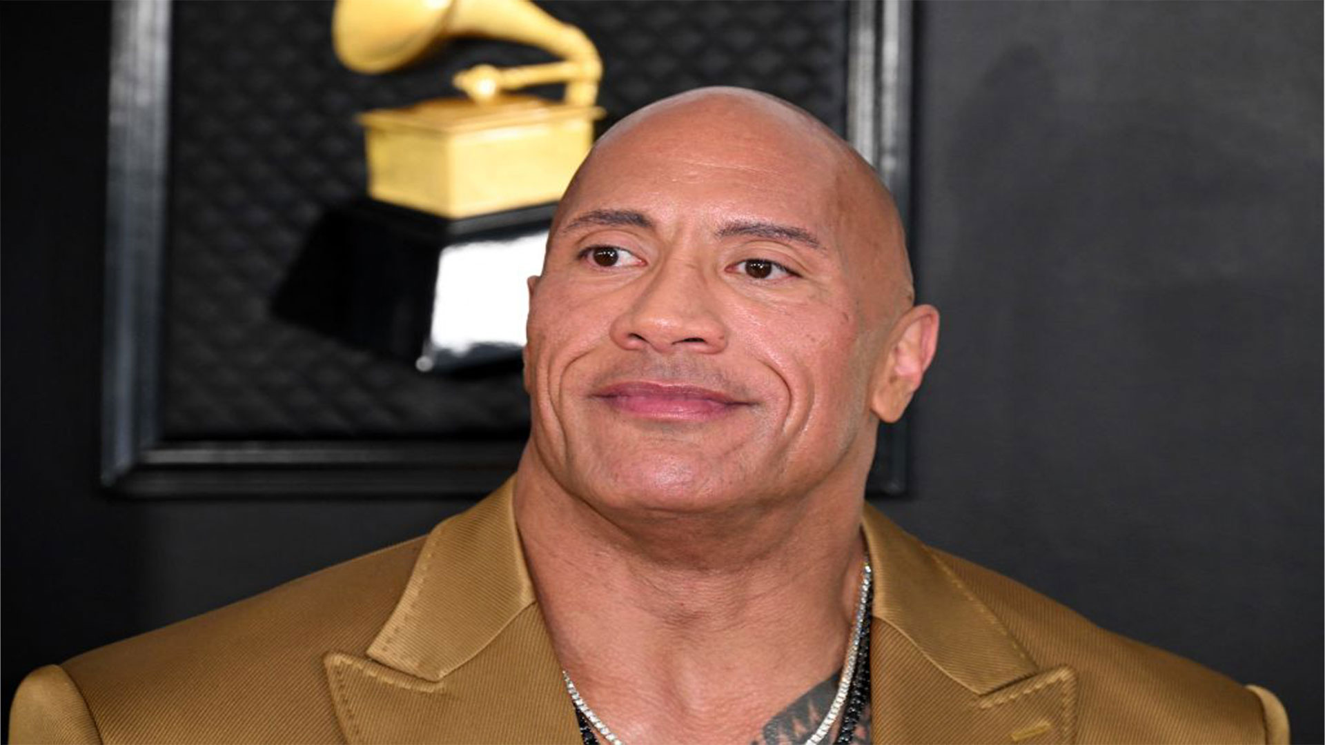 The Rock’s Wax Statue Sparks Controversy Over Skin Tone